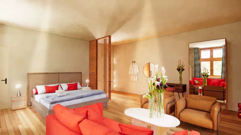 The suite offers an elegant and bright setting for your stay, with a sleeping area and a sitting area with a direct view of the castle grounds.